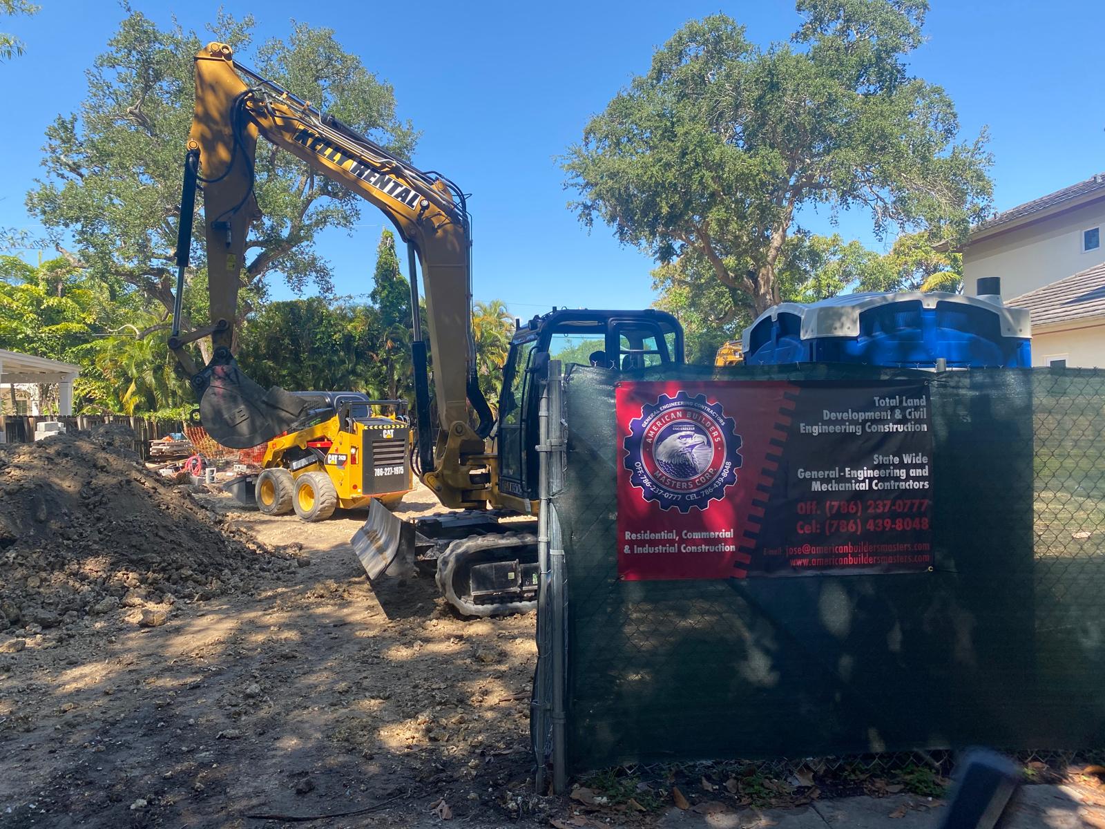 ABM heavy equipment on a construction site